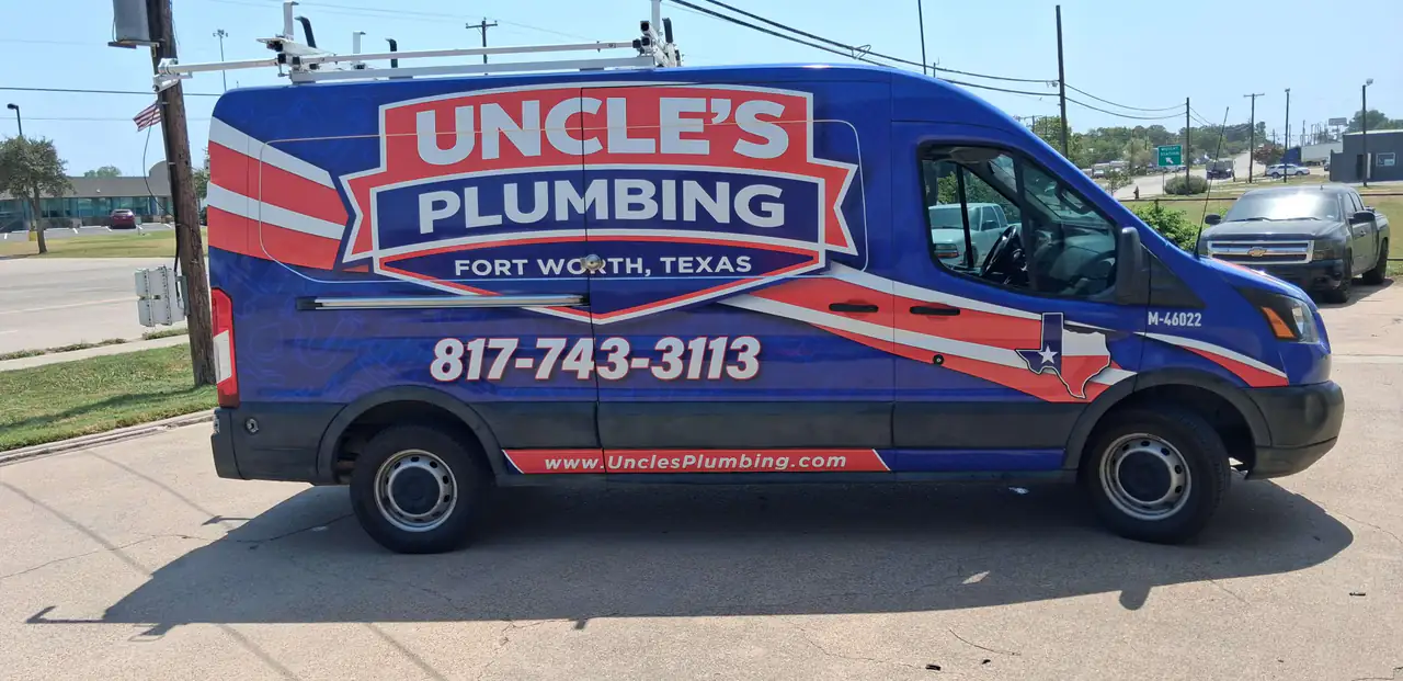 Side profile of an Uncle's Plumbing van showing the full brand lockup, phone number and Texas license number